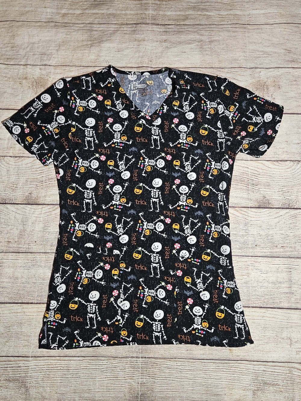 Scrubaid Halloween trick or treat skeleton scrub top